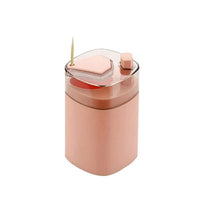 Toothpick holder with -up feature, automatic dispenser for convenient use.